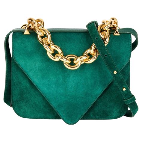 emerald green suede handbags